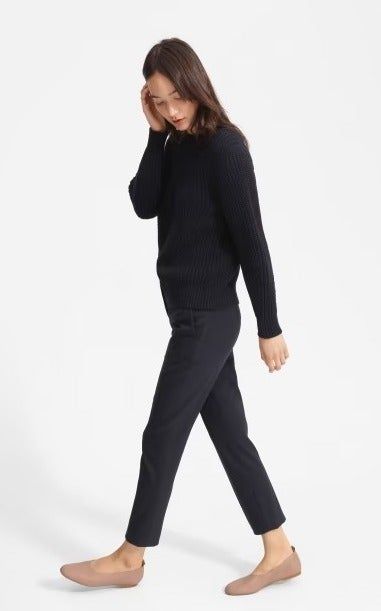 Model showing off the tan flats