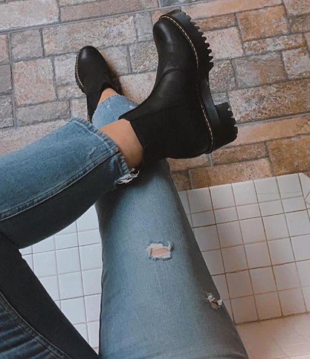 Overhead view of the reviewer wearing the black boots