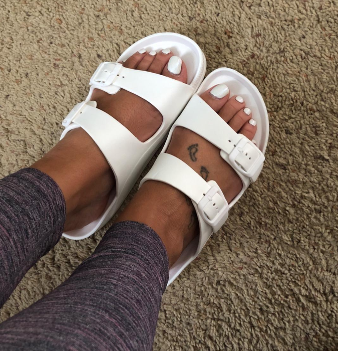 Another reviewer wearing navy and white double buckle sandals