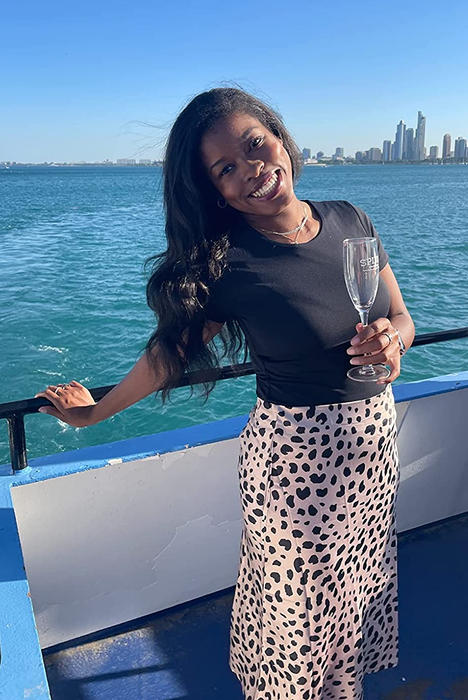 Reviewer showcasing the leopard-print skirt