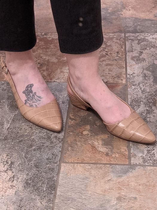 Reviewer wearing the beige slingbacks