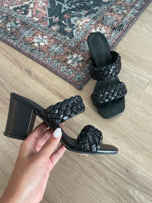 a reviewer's black-colored shoes