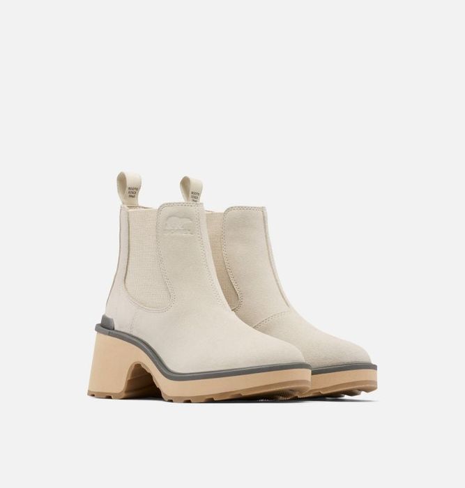 The beige boots featuring a chunky heel