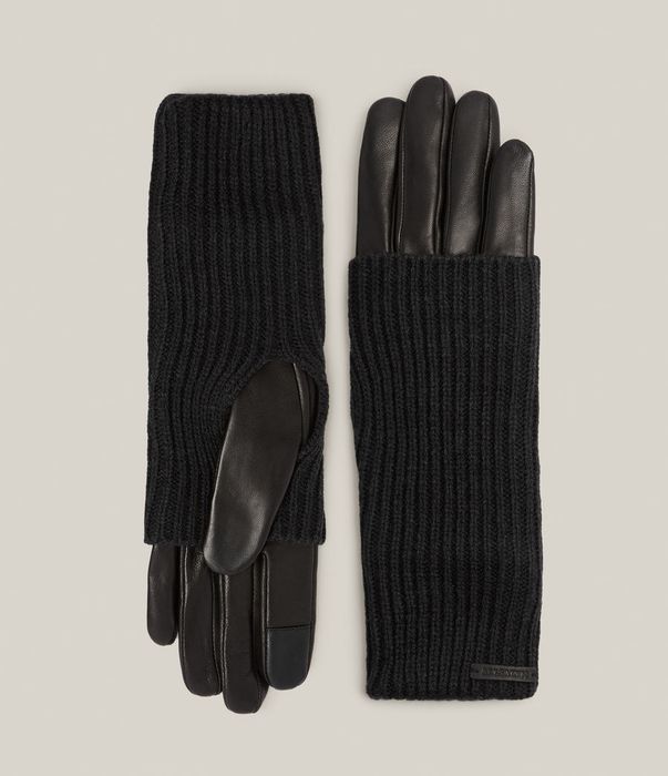 These black knit gloves paired with black leather are the perfect blend of warmth and style.