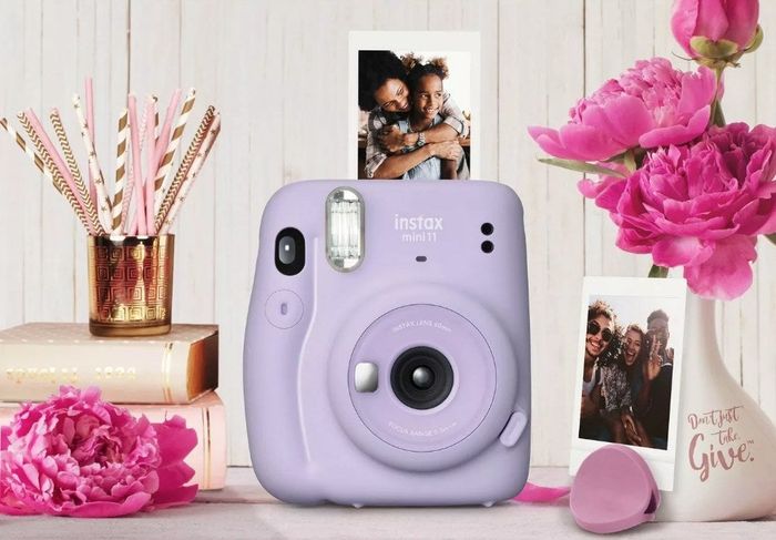 A purple Polaroid camera