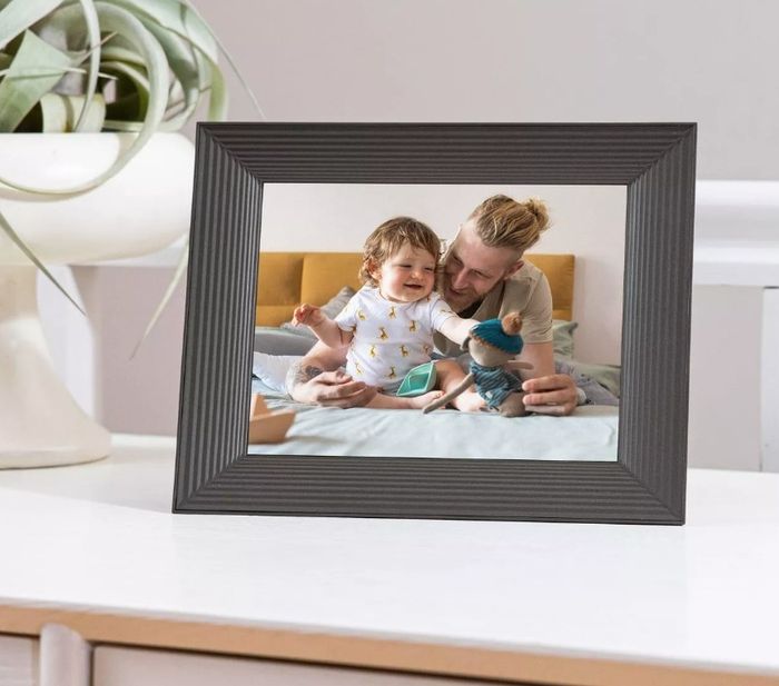 A sleek black digital picture frame