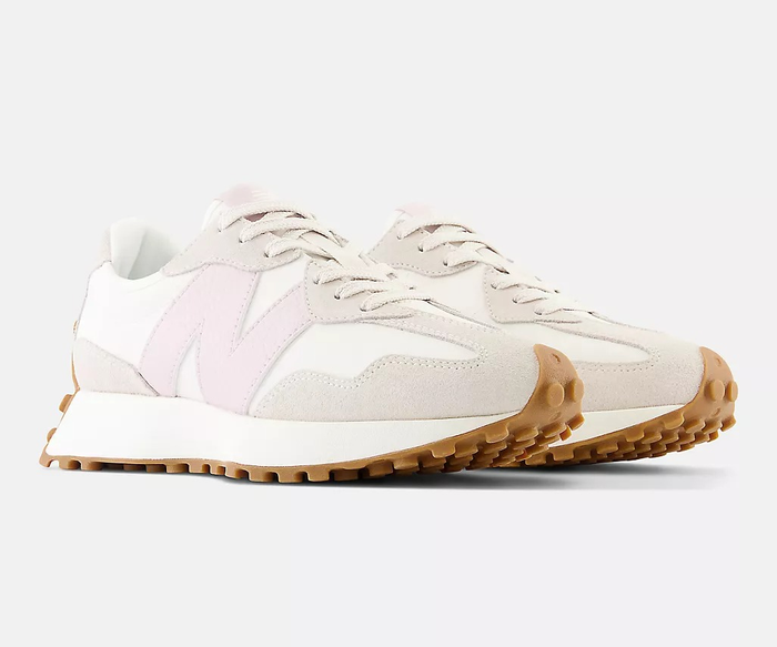 the sneakers in white, tan, and pink hues