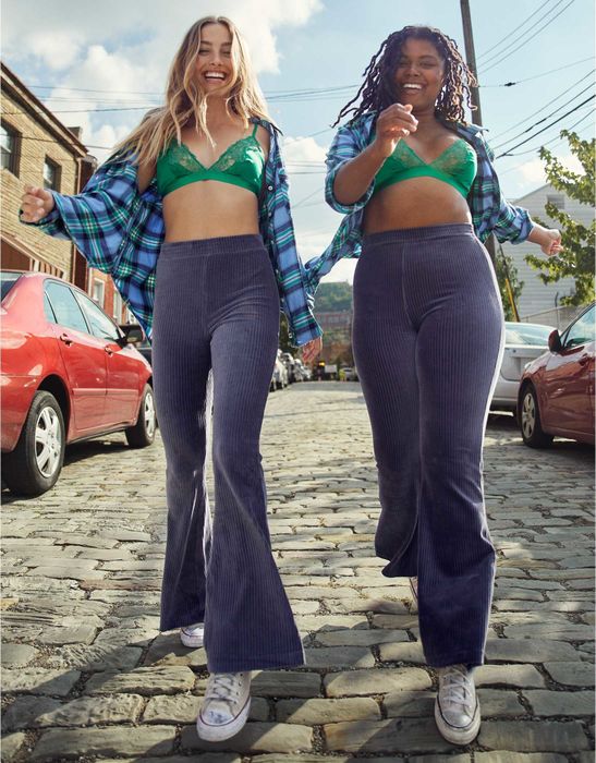 Models rocking the purpley-grey velour pants