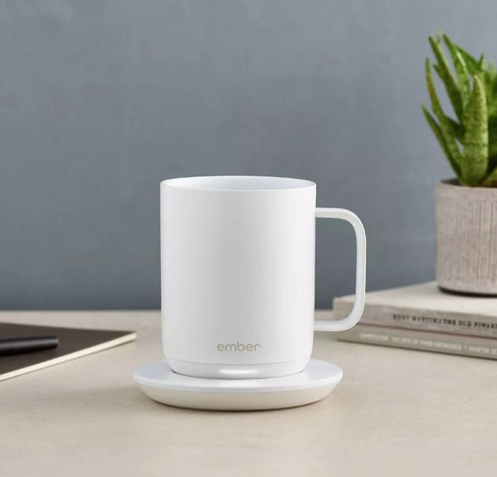 A white, temperature-controlled smart mug