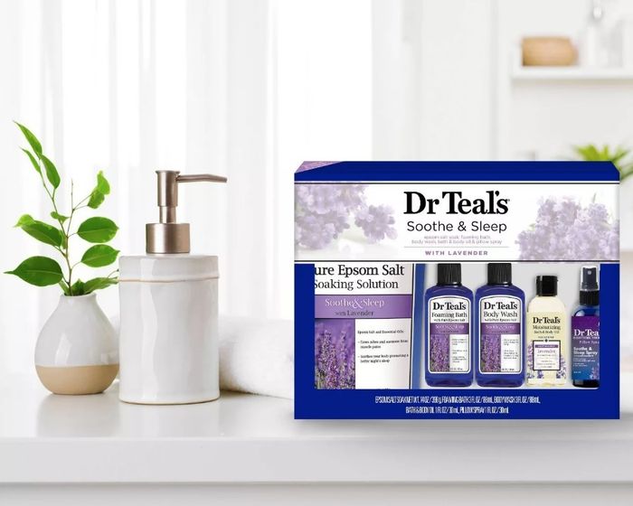 A bath gift set featuring soaking solution, foaming bath, body wash, bath oil, and pillow sleep spray