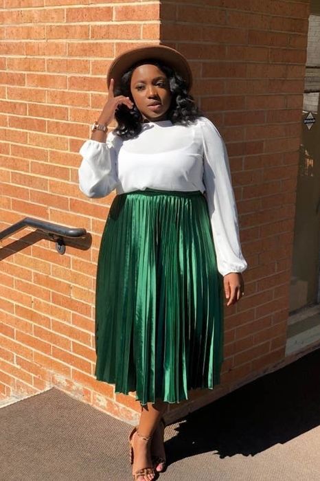 Another reviewer rocking the green metallic skirt, proving its versatile charm