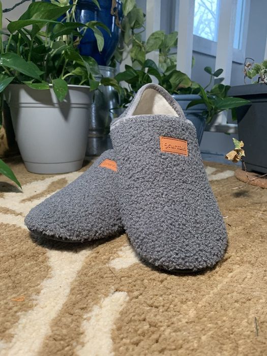The grey slippers on display