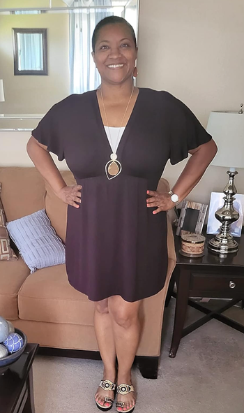 A reviewer rocking the black version of the same dress.