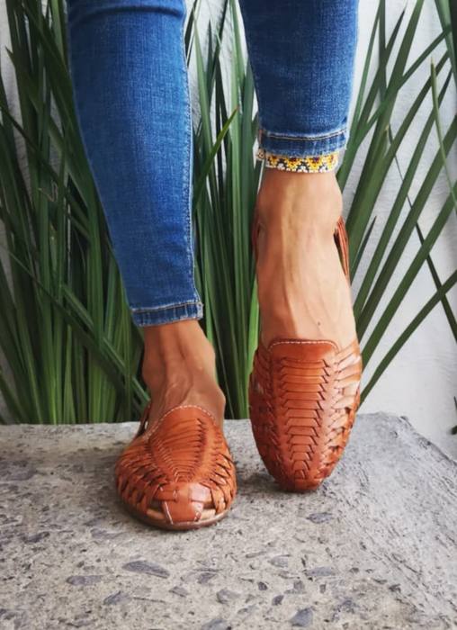 Front view of a model sporting the brown huaraches