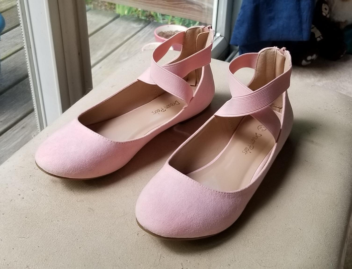 A reviewer’s pair of pink ankle-strap flats