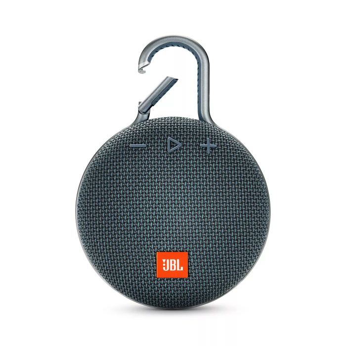 The round, portable speaker features a hook, making it easy to attach to clothing or a backpack for music on the go.