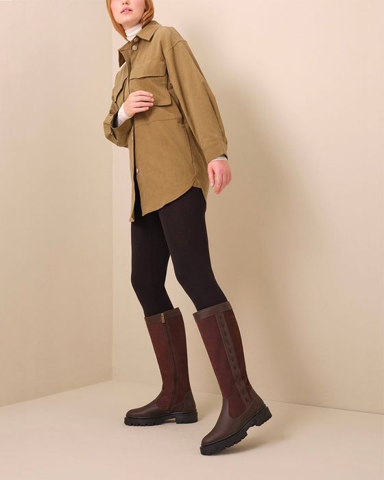 Model wearing the brown boots