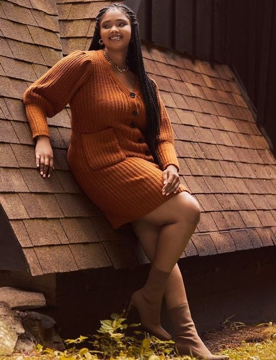 model wearing a caramel-colored dress