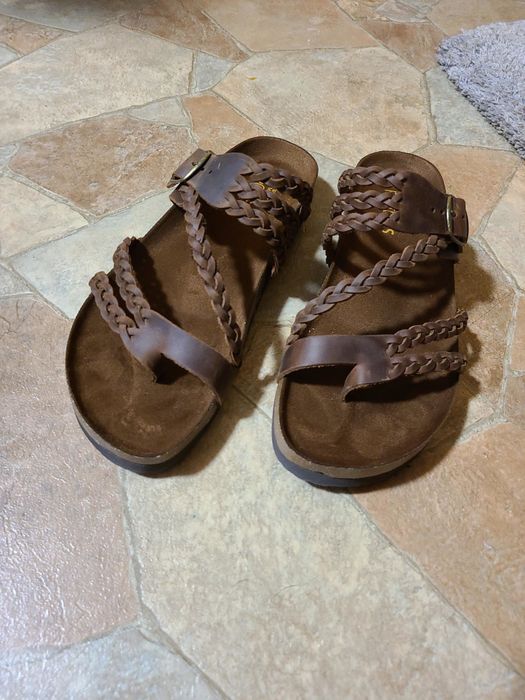a reviewer's brown shoes