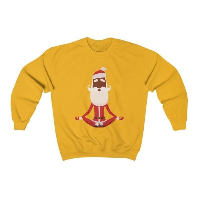 A yellow sweatshirt featuring a Black Santa in a yoga pose, sitting cross-legged.