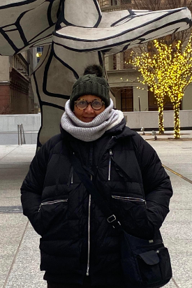 A reviewer dressed in the coat in black.