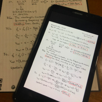 A reviewer's notebook page, with the same notes shown on a smartphone screen.