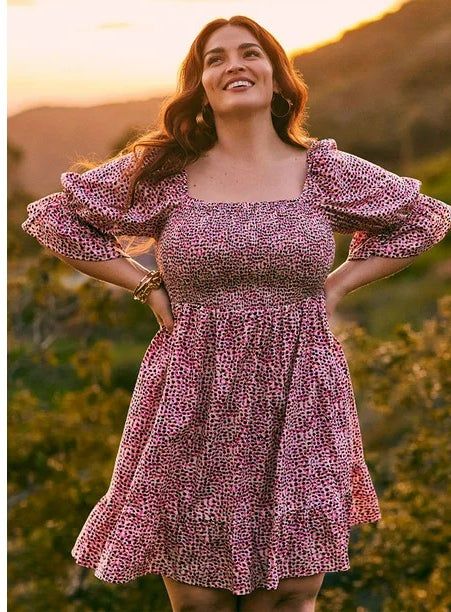 Model showcasing the flame paint speckle dress