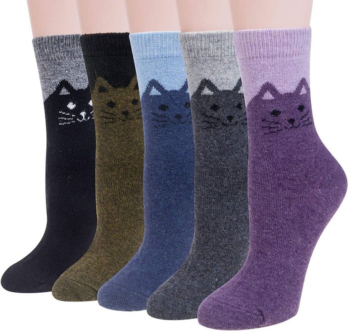 The socks come in a variety of color combinations: gray and black, black and olive, blue, gray, and purple.