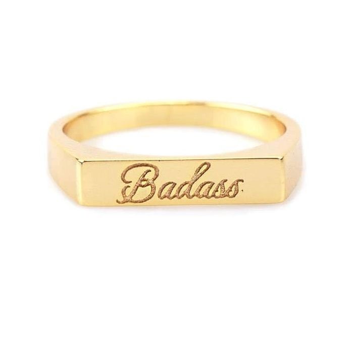 The gold ring engraved with the word