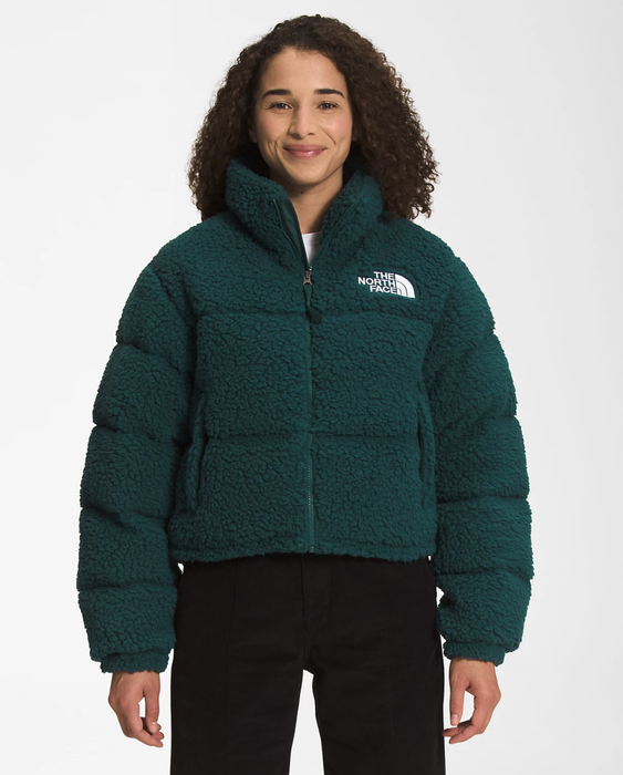 Model wearing a puffy, dark green fleece jacket