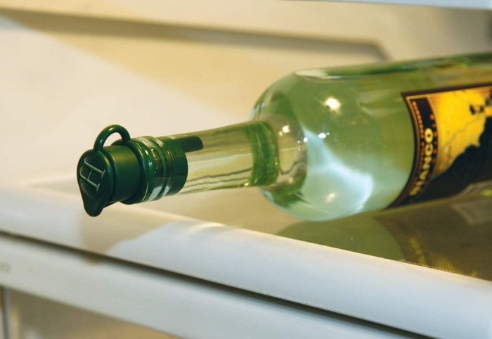 The wine stopper elegantly placed in a bottle of wine