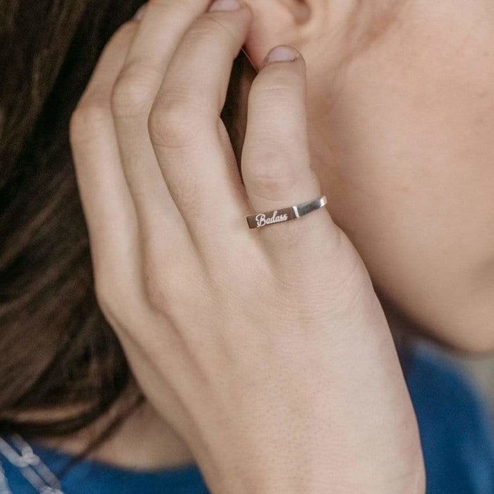A model showcasing the delicate silver ring.