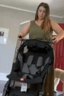 GIF of the reviewer demonstrating how the stroller folds up quickly and neatly