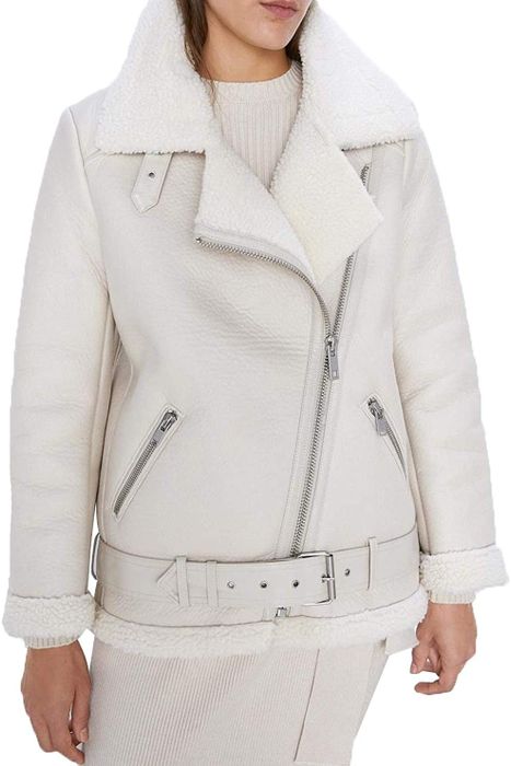 A model wearing the white jacket