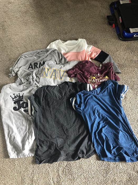 Image showing seven shirts before being packed into a compression cube