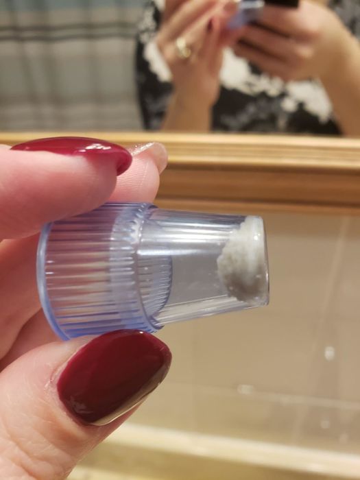 A reviewer’s photo showing the debris the vacuum extracted from their skin