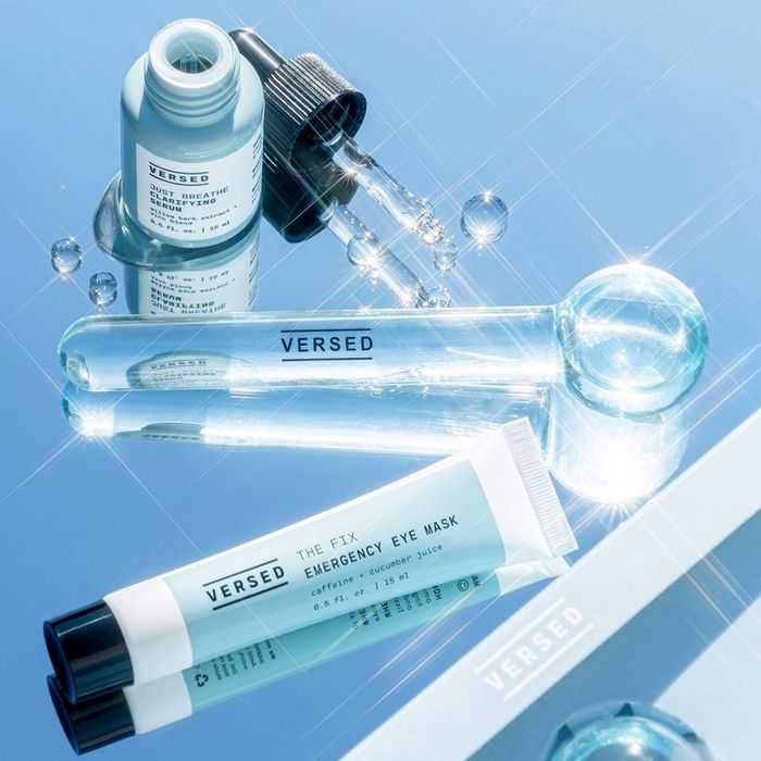 The dropper bottle of serum, a clear cooling wand, and a tube of face mask.