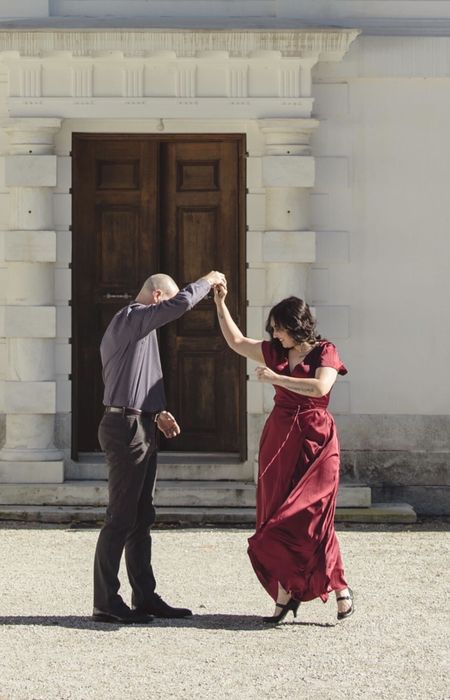 The same writer is dancing in the dress, showing off its movement.