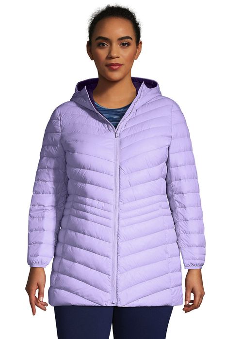 Model wearing a light purple puffer jacket.