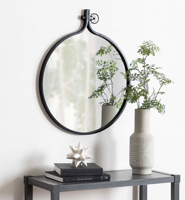 Kate and Laurel Yitro metal wall mirror.