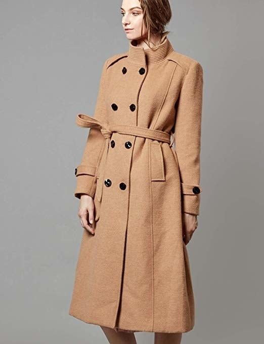 A model rocking the trench coat in a warm camel color