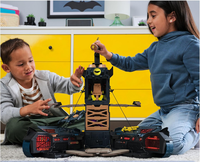Batmobile unfolding to reveal the playset