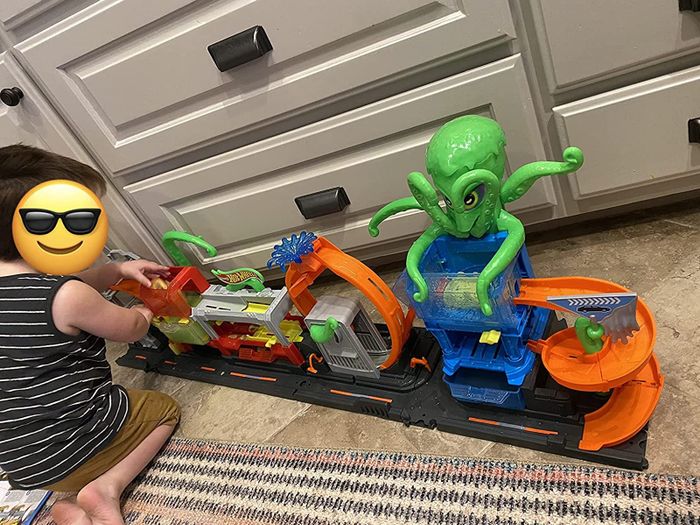 Reviewer’s photo of their child playing with the car wash toy