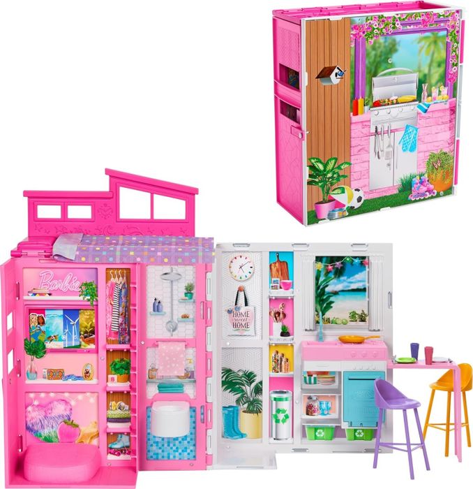 Barbie Dreamhouse playset with open panels showcasing the rooms