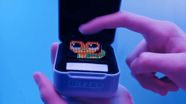A gif of a child gently petting the virtual pet