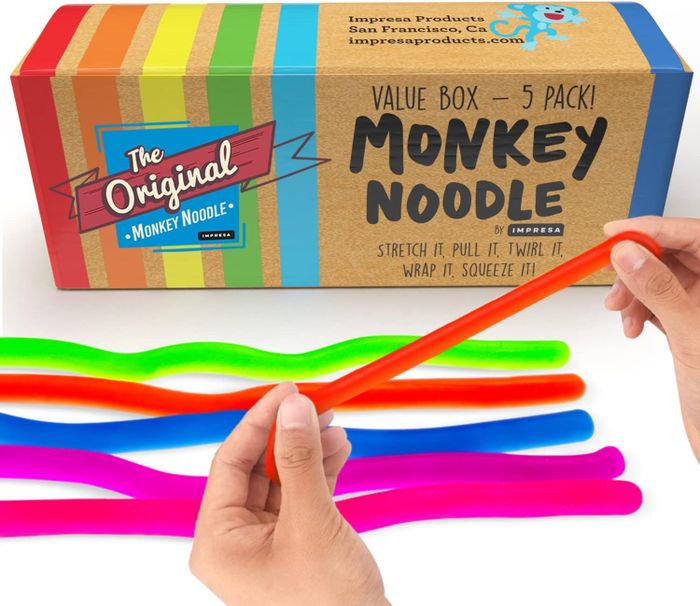 A person stretching the noodle-like toy.