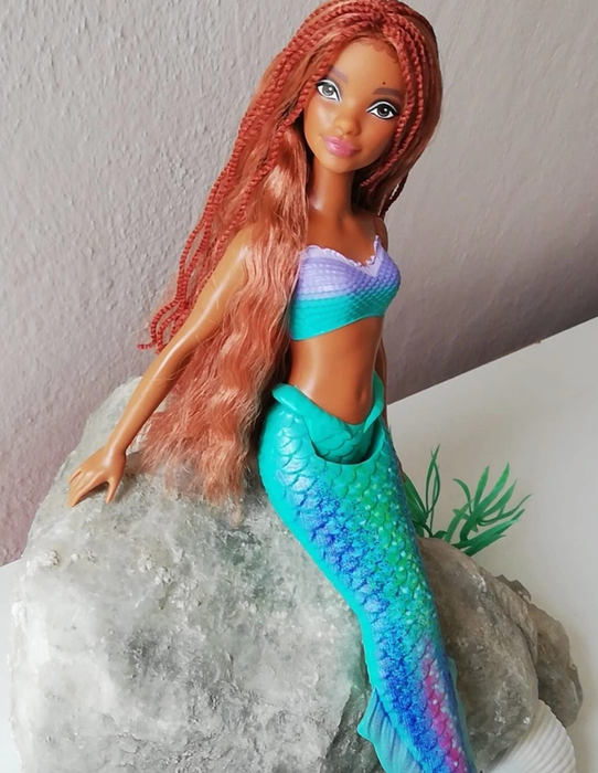 The reviewer's Ariel doll posed gracefully on a rock.