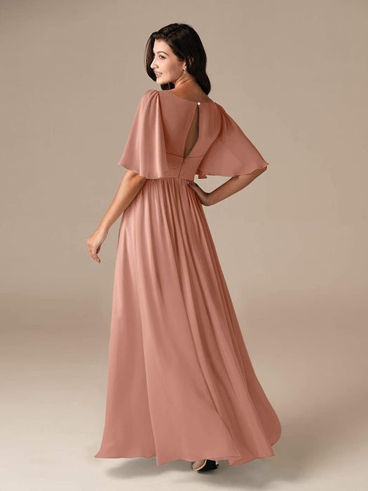 The same model presents the back view of the stunning dress in mauve.