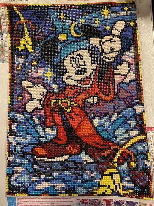 A DIY diamond-studded art piece featuring Sorcerer Mickey