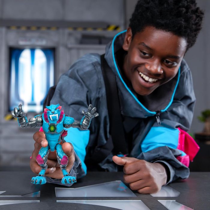 A child holding a Mr. Beast toy